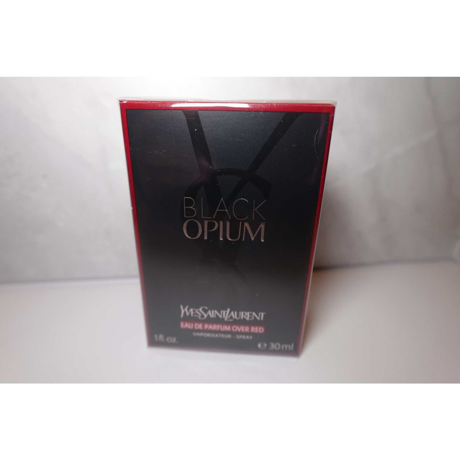 Yves Saint Laurent  Black Opium Eau de Parfum Over Red with Cherry & Coffee 1 fl oz